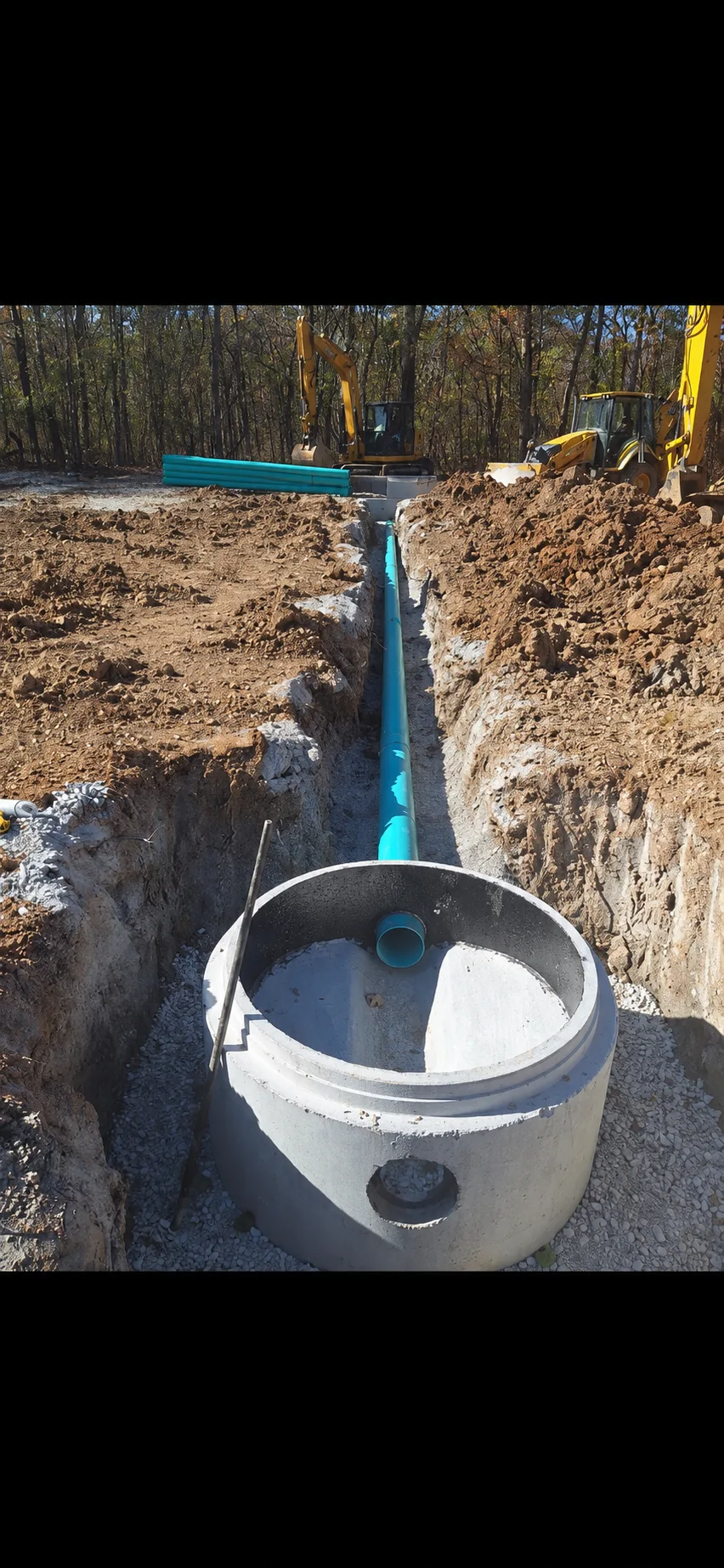 Waterline installation, open trench with PVC main and field crew